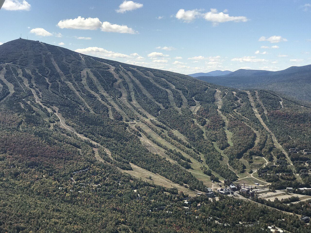 Sugarloaf Mountain rising above Carrabassett Valley in early autumn