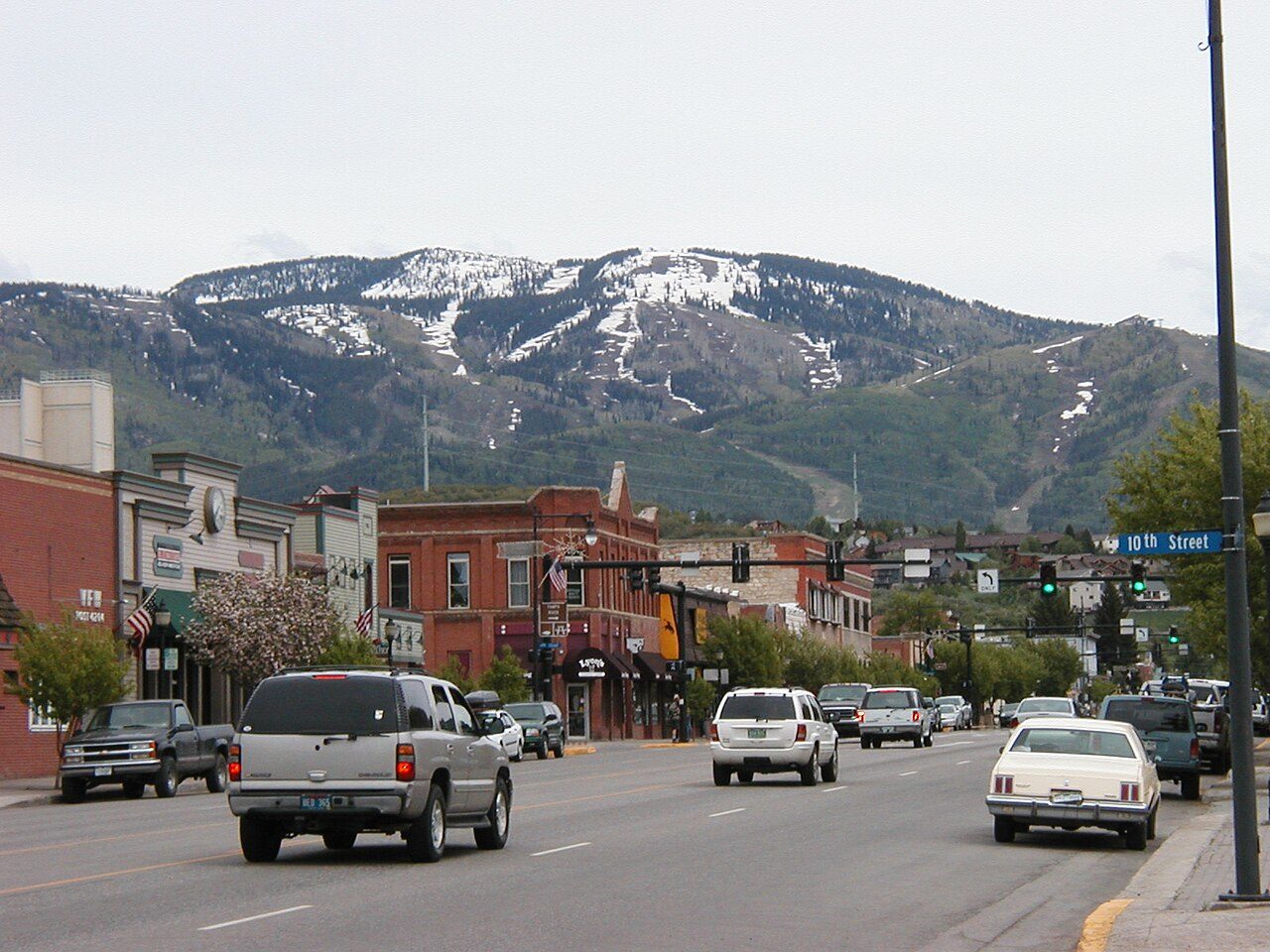 Downtown Steamboat Springs with snow-patched mountains behind
