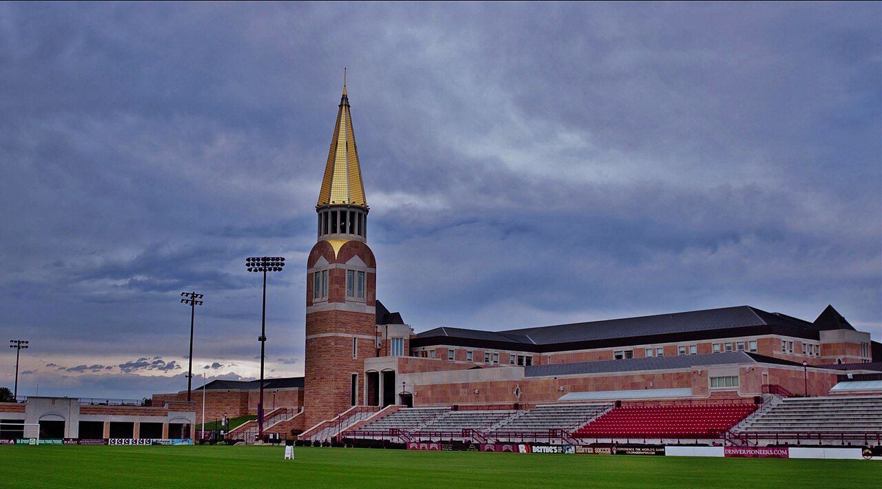 The Ritchie Center for Sports and Wellness with its gold tower on the DU campus