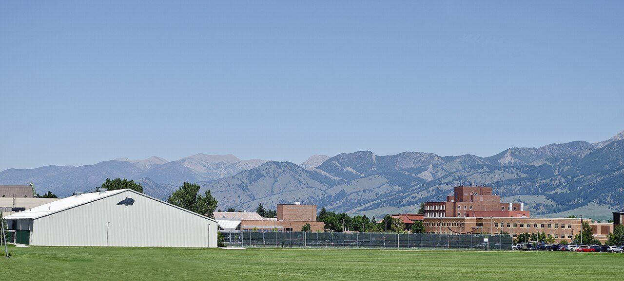Montana State University campus and agricultural fields with the Bridger Mountains behind