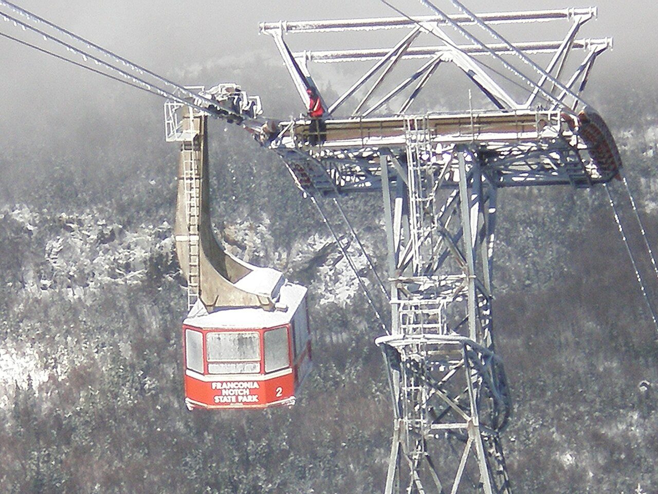 A Cannon Mountain aerial tramway car at the upper tower in winter