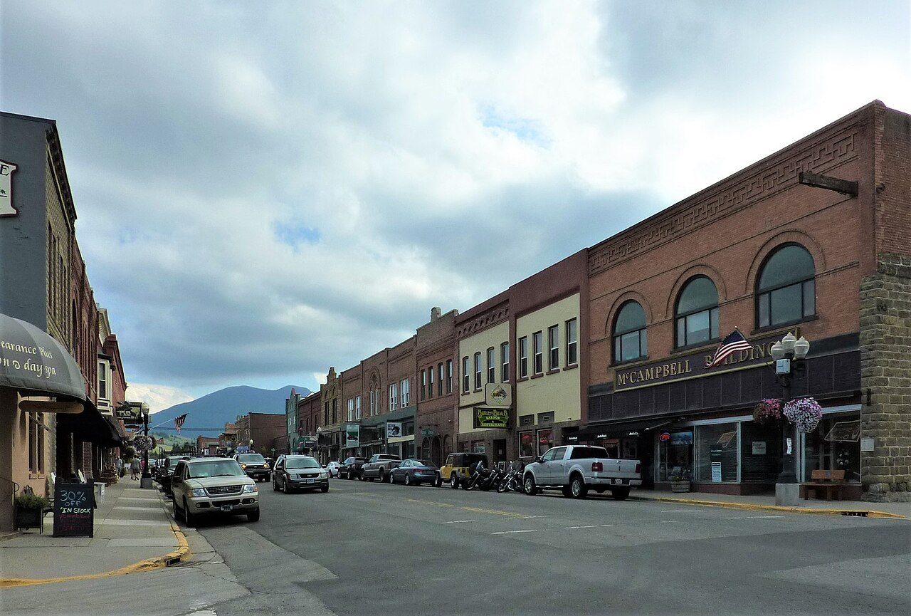 Main street of Red Lodge, Montana, with mountains behind