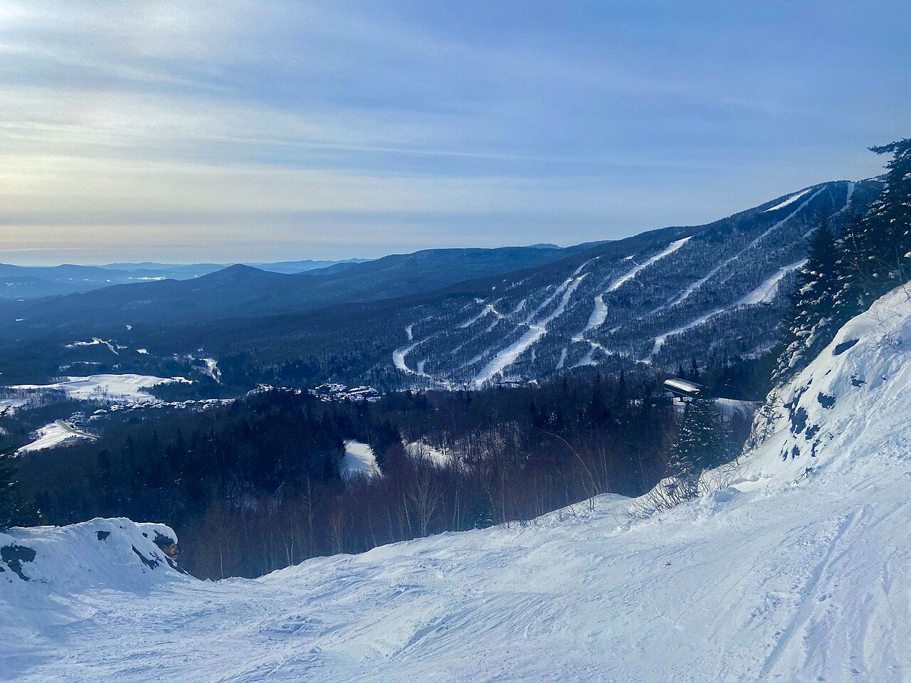 A mogul trail at Stowe with Mount Mansfield's neighboring peak behind